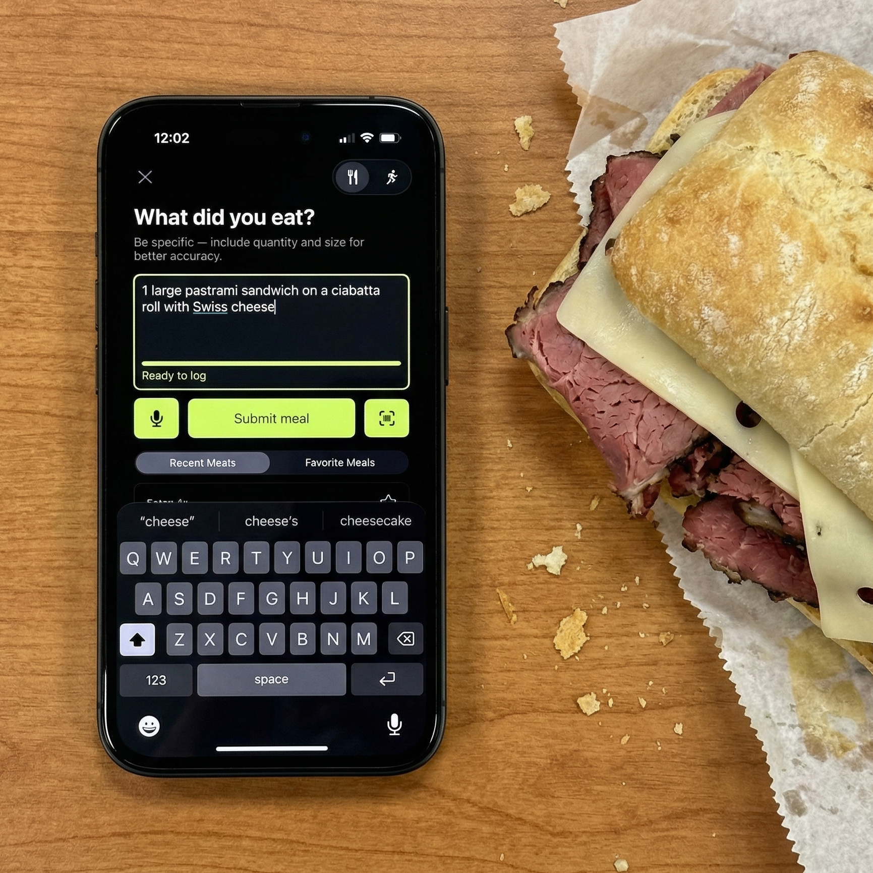 On a sandwich shop counter next to a pastrami sandwich