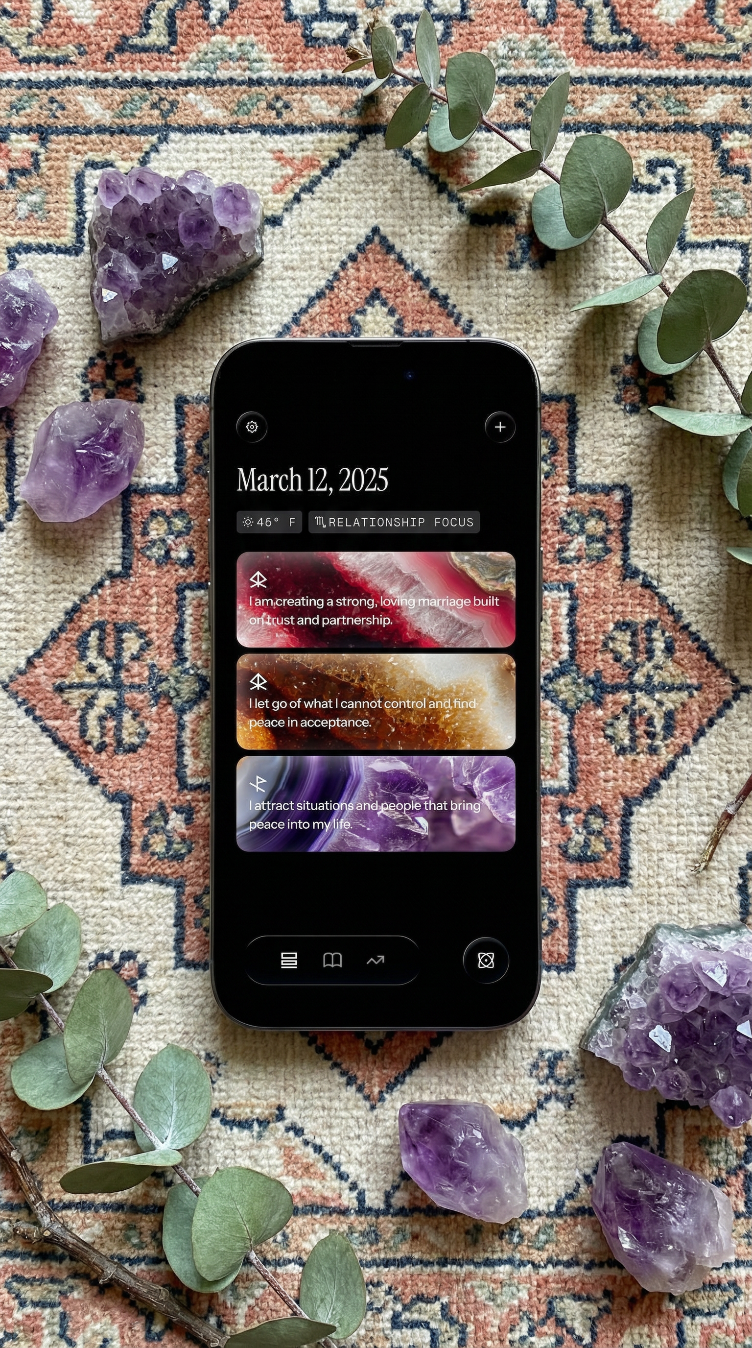 On a Turkish rug with amethyst crystals and some eucalyptus nearby